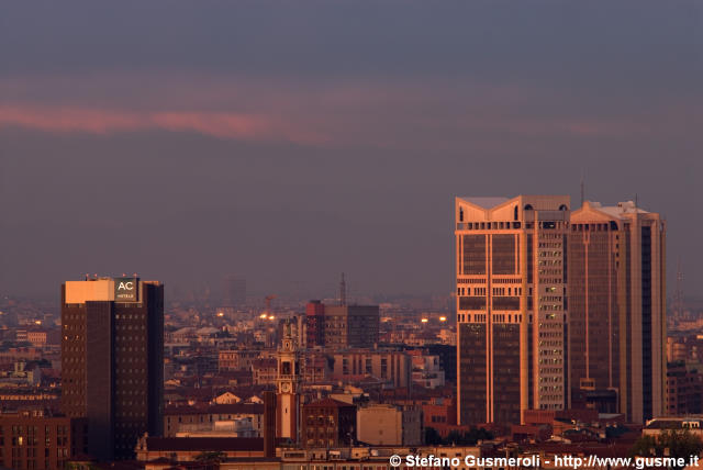  Ac Hotel e torri Garibaldi al tramonto - click to next image